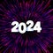 New Year 2024 paper numbers for calendar on colorful background made of exploding fireworks particles