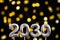 New year 2030 - Silver number on black background with defocused lights
