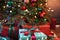 New Year background. Christmas tree with red and green gifts