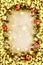 New Year. Background, frame of Christmas tree branches and Christmas decorations. Golden snow. Free space for text.