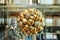 New Year background. New Year`s round golden balls. Christmas balls close up picture. Three golden christmas sparkling