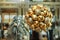 New Year background. New Year`s round golden balls. Christmas balls close up picture. Three golden christmas sparkling