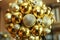 New Year background. New Year`s round golden balls. Christmas balls close up picture. Three golden christmas sparkling