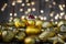 New Year card. Christmas decoration duckling in Santa Claus hat among golden Christmas balls