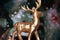 New Year card. Golden figure of a deer in neon aurora. Image with selective focus