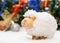 New year card with a sheep a symbol of 2015 on christmas decoration