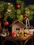 New Year and Christmas card, composition in the interior with coniferous branches, a house, balls