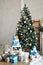 New Year, Christmas decor: New Year tree, gifts, teddy bear. New year, christmas, holidays.