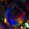 New Year, Christmas, festive background. Magical rainbow Christmas ball