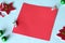 New Year and Christmas flat lay background with blank red square sheet of paper and copy space for text