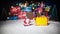 New year or Christmas holiday shopping concept. Store promotions. Santa Claus and yellow sticker for your text on snow. Stack of