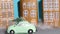 New Year or Christmas stop motion animation. A cute toy green car with a Christmas tree on the roof drives down the