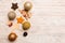 New Year composition made of baubles, reindeer and other decorations on wooden background. Christmas time concept with empty space