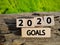 new year concept of 2020 goals text on wooden blocks