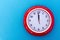 New year concept - Red wall clock pointing at 12 o`clock