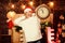 New year countdown. Merry christmas. Time for miracles. Few minutes left. Woman Santa hat hold vintage clock. Time for
