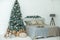 new year cozy home interior with christmas tree and garlands