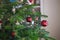 New year cozy home interior with Christmas tree and garlands. Christmas decoration in house