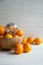 New Year decoration: orange mandarins and Christmas tree toy