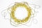 New year decorations of circle yellow tinsel, golden bumps, chain of balls on a white background. Christmas Ñoncept