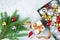 New Year decorative border, festive frame, Christmas tree glass balls decorations, green pine branches, gift box, gold ribbon