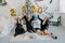New Year Eve party. Celebrating of New Year. Three beautiful young girls with golden baloons 2020 celebrating new year. Young