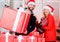 New year gift. Gift from Santa Claus. Man and woman with gift boxes. Family shopping. Seasonal sale. Guy with big gift