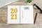 New Year goals List 2021 on wooden desk