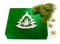 New Year green box with twig Christmas tree