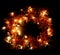 New Year Holiday celebration light garland, Christmas Tree decoration and yellow gold shining tinsel wreath oval frame