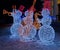 New year illumination 2020. The concept of New year and Christmas. Magical new year`s eve.Jazz band of merry snowmen.