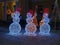 New year illumination 2020. The concept of New year and Christmas. Magical new year`s eve.Jazz band of merry snowmen.