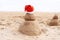 New Year or Merry Christmas sand snowman on ocean beach