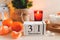 New Year morning composition with wooden calendar date December 31. Beautiful cozy home decor composition with candles, lantern,