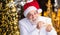 New Year party. bearded man hold snowman toy made of food. christmas composition. senior businessman in santa claus hat