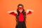 New year party. Carnival party. Masquerade concept. Kid wear eye mask. Girl wear mask orange background. Event and