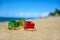 New year present boxes on caribbean beach