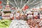 New Year`s atmosphere in the supermarket. Traditional Christmas decoration of shops. Large assortment of sweets. Moscow, Russia,