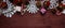 New Year`s Christmas concept. Snowflakes cut from paper, gifts, scissors on a wooden table