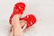 New Year`s, Christmas slippers for adults are dressed for the child. On white soft fur. Funny, funny, humorous, cozy,