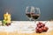 New year\'s eve cheers with two glasses of red wine and grapes