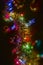 New Year\\\'s garland with colored lights and festive New Year\\\'s tinsel.
