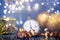New Year\\\'s at midnight - Old clock with Christmas decoration, champagne and holiday lights