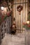 New Year`s porch decorated with Christmas wreath, snow and toy g