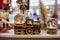 New Year\\\'s toy steam locomotive with a sleeping woman on the store counter.