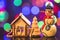 New Year theme. 2017 year figures with decorative house, fir tree and snowman on lights background