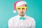 New Year theme Christmas winter holidays office company employees. portrait Caucasian male business funny Santa Claus hat glasses