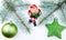 New year toys green ball star Santa Claus fir tree white background