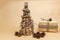New year tree hand made in eco style with gift packed in paper and pinecones