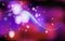 New Years, Christmas chaotic blur bokeh of light balloons on background purple. Snowflakes. Vector illustration for design and